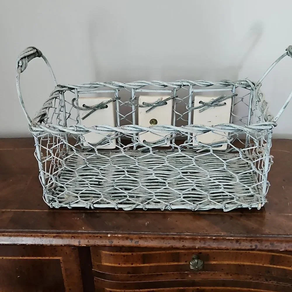 Vintage basket decorated with ceramic tiles